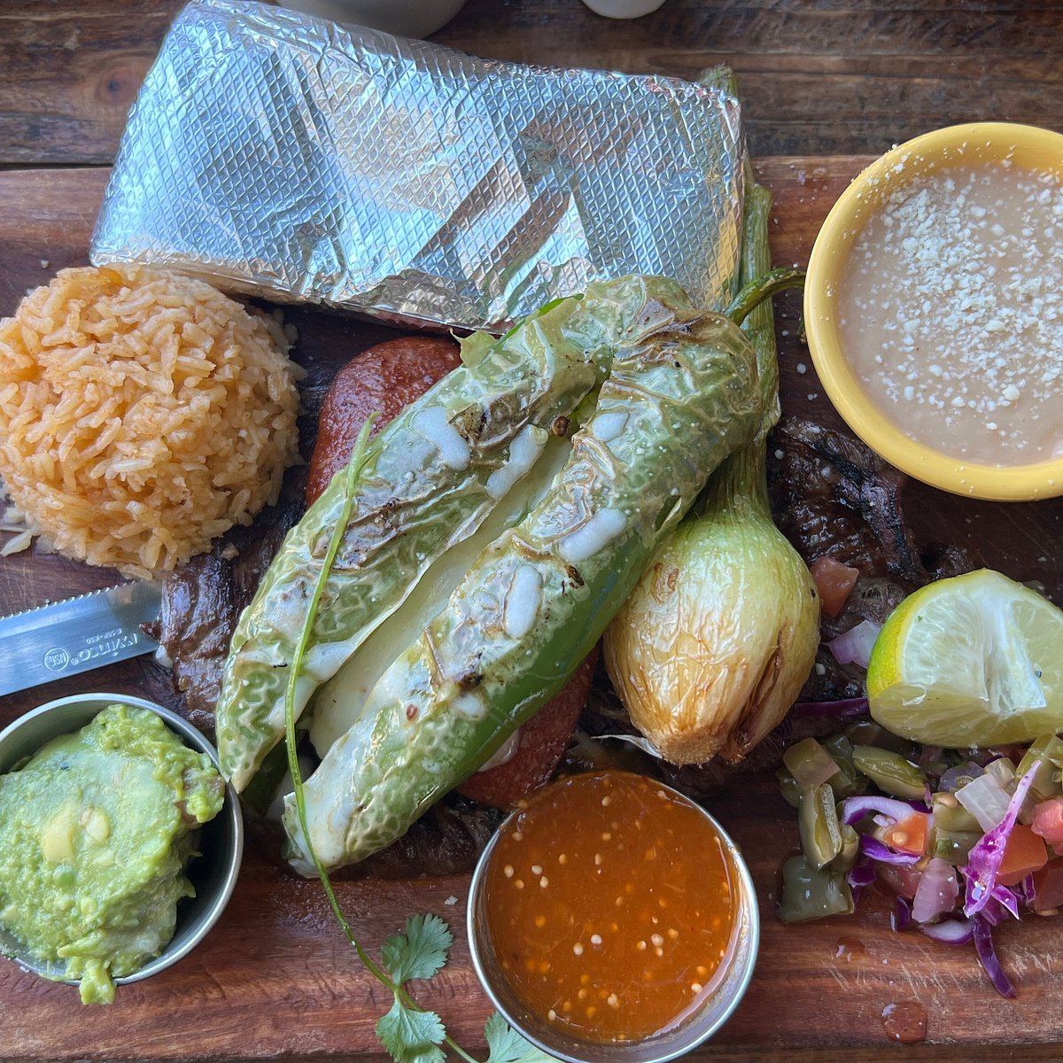 El Patio signature dishes Arrachera BurritoCarne en Su JugoChiles Gueros